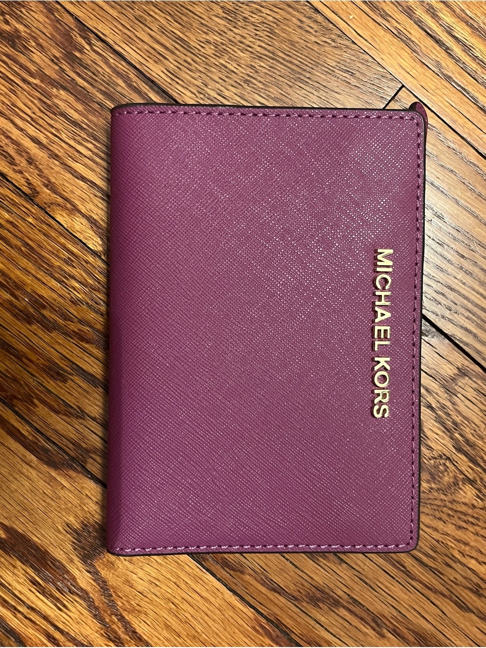 Michael Kors Plum Saffiano Passport Holder with Gold Logo